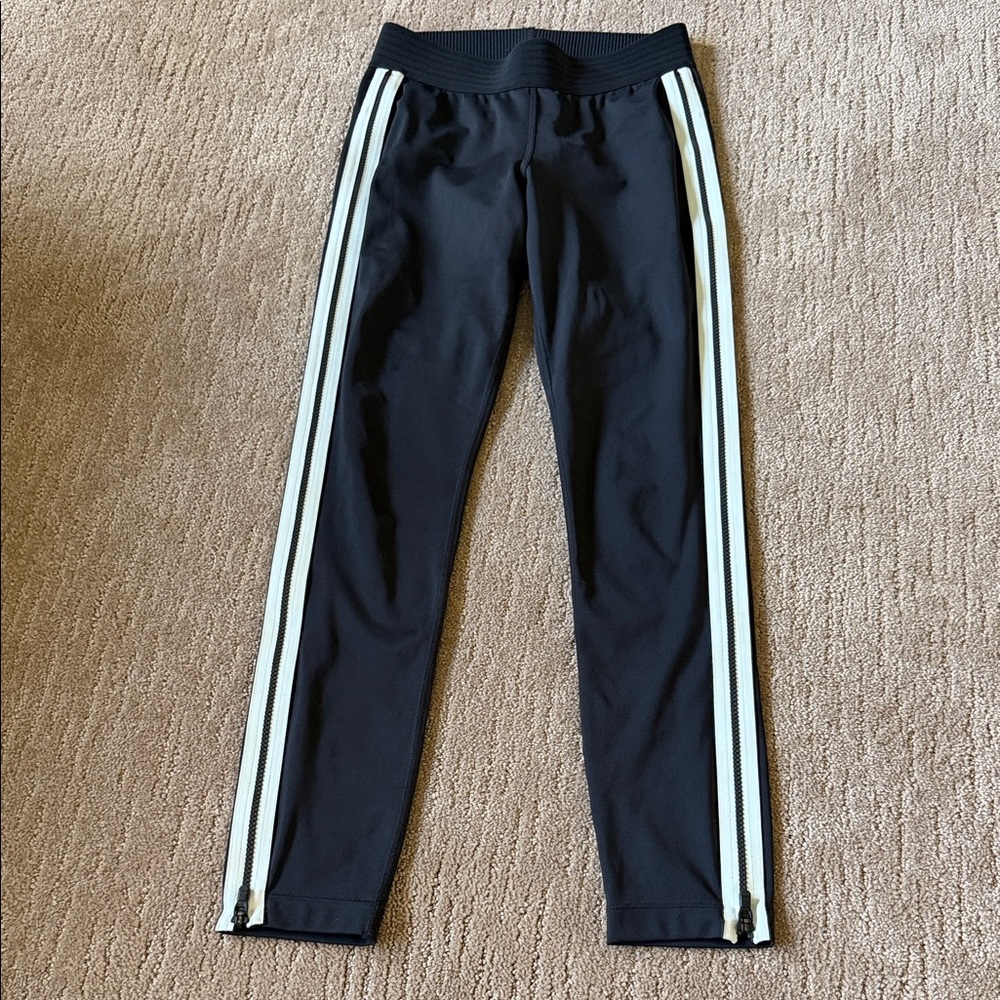 Derek Lam x Athleta Black Leggings with white stripes and Zip detail